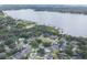 Community featuring lakeside homes nestled among mature trees, offering a serene and picturesque setting at 19624 Spring Oak Dr, Eustis, FL 32736