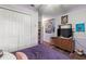 Relaxing bedroom featuring a spacious closet and a cozy dresser at 19624 Spring Oak Dr, Eustis, FL 32736