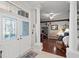 Inviting entryway with decorative glass double doors and an elegant pillar leading into the living space at 19624 Spring Oak Dr, Eustis, FL 32736