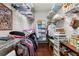 Spacious walk-in closet with wire shelving for efficient storage and organization of clothing at 19624 Spring Oak Dr, Eustis, FL 32736