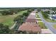 Lovely community on golf course with well-kept lawns, lush landscaping and homes with screened-in lanais and pools at 1972 Palo Alto Ave, The Villages, FL 32159