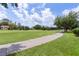 Picturesque view of a golf course with lush green fairways and mature trees at 1972 Palo Alto Ave, The Villages, FL 32159