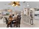 Bright and airy open space with a combination of breakfast nook, kitchen, and living area at 1972 Palo Alto Ave, The Villages, FL 32159