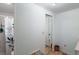 Bright bathroom featuring a tiled shower, mirrored closet, and tiled floor at 2110 Oak Cir, Mount Dora, FL 32757
