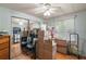 Cluttered bedroom with mirrored closets, wood floors, and lots of storage boxes at 2110 Oak Cir, Mount Dora, FL 32757