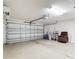 Spacious garage with an automatic door and room for storage and organization at 2202 Kershaw Rd, The Villages, FL 32162