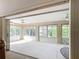 Enclosed lanai with bright natural light, ceiling fans, and tile floor at 2202 Kershaw Rd, The Villages, FL 32162