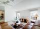 Inviting living area with an entertainment center and plentiful natural light at 2202 Kershaw Rd, The Villages, FL 32162