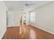Comfortable bedroom with ceiling fan and an attached bathroom at 2242 Orkney Dr, Leesburg, FL 34788