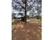 Back of home features an open covered patio area at 23130 Brouwertown Rd, Howey In The Hills, FL 34737