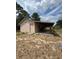 Building includes a workshop with open covered area attached at 23130 Brouwertown Rd, Howey In The Hills, FL 34737