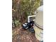 An outdoor pump and filter for the in-ground pool at 23130 Brouwertown Rd, Howey In The Hills, FL 34737