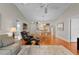 Spacious home showcasing a living room, dining area, and kitchen in an open concept design at 2369 Five Forks Trl, The Villages, FL 32162