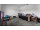 Comfortable living room area with a couch and desk at 23707 Companero Dr, Sorrento, FL 32776