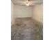 A bedroom with ceiling fan, bare floors and plenty of natural light at 2421 Centennial Blvd, Leesburg, FL 34748