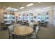 Inviting community room with ample seating, bright lighting, and charming decor at 2457 Bar Harbor, Mount Dora, FL 32757
