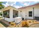Well-maintained home exterior with generator and landscaped yard at 2457 Bar Harbor, Mount Dora, FL 32757