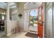 Inviting foyer with a view to the front porch, showcasing the home's bright and welcoming interior at 2457 Bar Harbor, Mount Dora, FL 32757
