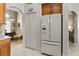 Pantry and refrigerator are conveniently located in the kitchen area at 2457 Bar Harbor, Mount Dora, FL 32757