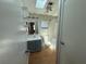 Well-lit bathroom featuring a vanity, and a shower with a window at 24841 Pine Hl, Leesburg, FL 34748