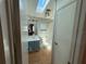 Bathroom featuring a skylight, vanity, toilet, tub and shower, and a tiled floor at 24841 Pine Hl, Leesburg, FL 34748
