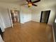 Bright, open bedroom with hardwood floors and closet access at 24841 Pine Hl, Leesburg, FL 34748