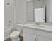 Bright bathroom featuring tile floors, white fixtures, and a shower-tub combo at 2860 Supermarine Rd, Tavares, FL 32778