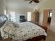 Comfortable bedroom featuring a wooden bed frame and nautical-themed decor at 2918 Canyon Ave, The Villages, FL 32163