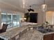 Granite countertops complement this kitchen that offers outdoor views at 2918 Canyon Ave, The Villages, FL 32163