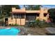 Backyard pool and screened-in lanai, perfect for enjoying outdoor living and relaxing poolside at 308 Sunnyside Dr, Leesburg, FL 34748