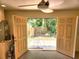 Open utility room with double doors leading to the outdoor deck area at 308 Sunnyside Dr, Leesburg, FL 34748