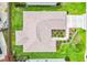 Aerial view showcasing a home's roof, well-maintained landscaping, and surrounding neighborhood in a peaceful community at 3118 Sweetgum St, The Villages, FL 32163