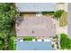 Aerial view of a single-Gathering home with a brown roof and well-manicured landscaping at 3472 Roanoke St, The Villages, FL 32162