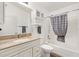 Neutral bathroom with vanity, shower, and tub combination at 3472 Roanoke St, The Villages, FL 32162