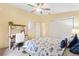 Welcoming bedroom including a work space and ample closet space at 3472 Roanoke St, The Villages, FL 32162