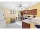 Cozy eat-in kitchen with stainless steel appliances and beautiful countertops at 3472 Roanoke St, The Villages, FL 32162