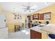 Bright eat-in kitchen featuring stainless appliances, granite counters, and open layout at 3472 Roanoke St, The Villages, FL 32162