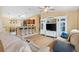 Bright, open-concept living space featuring a breakfast bar and seamless flow to kitchen at 3472 Roanoke St, The Villages, FL 32162