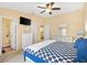 Comfortable primary bedroom featuring ensuite bathroom and neutral color palette at 3472 Roanoke St, The Villages, FL 32162