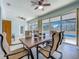 Bright sunroom with large windows offering a view of the pool, perfect for year-round enjoyment and entertainment at 3731 Peaceful Valley Dr, Clermont, FL 34711