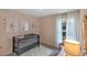 Cozy bedroom with pink walls, white curtains, crib and decorations at 4102 Penelope Ave, Lake Wales, FL 33859