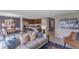 Stylish living room and dining area showcases an open-concept floor plan and lots of natural light at 4102 Penelope Ave, Lake Wales, FL 33859