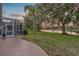 Spacious backyard with pond views and mature landscaping at 4879 Brightmour Cir, Orlando, FL 32837