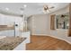 Well-equipped kitchen featuring granite counters, stainless appliances, and seamless access to the breakfast area at 4879 Brightmour Cir, Orlando, FL 32837