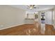 Bright living room with hardwood floors and access to a covered patio area at 4879 Brightmour Cir, Orlando, FL 32837