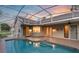Screened in pool with access to home through multiple doorways and windows at 4879 Brightmour Cir, Orlando, FL 32837
