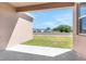 Concrete back porch provides a comfortable outdoor seating area at 4998 Abigail Dr, Lake Wales, FL 33859