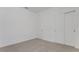 Bedroom features soft carpeting, closet, and base trim at 4998 Abigail Dr, Lake Wales, FL 33859