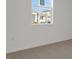 Bedroom features soft carpeting and a bright window at 4998 Abigail Dr, Lake Wales, FL 33859
