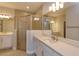 Modern bathroom featuring a glass shower and double vanity at 5006 Abigail Dr, Lake Wales, FL 33859